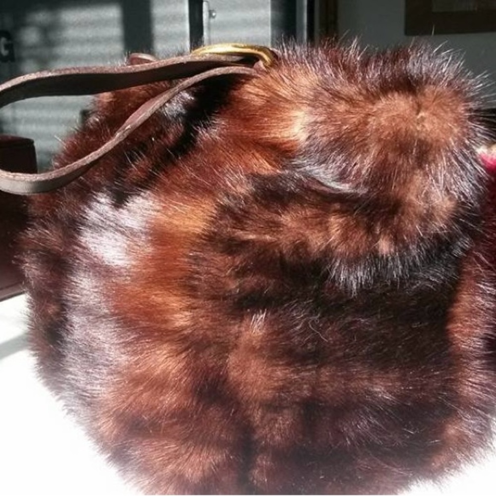 Coach Japanese Wrist Purse
Redesigned with Mink.